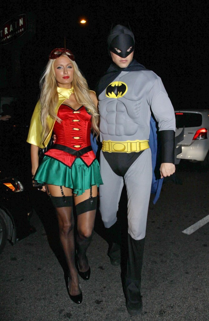 HOLY HALLOWEEN BATMAN!!! Sexy socialite Paris Hilton and model boyfriend River Viiperi seen wearing matching vintage 60's Batman and Robin costumes while arriving to a Halloween party hosted by Rihanna at The Greystone Nightclub in Hollywood