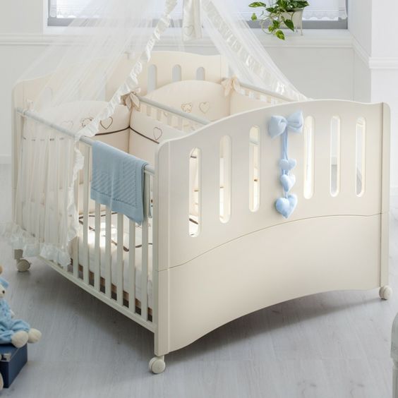 cuna para dos bebés
